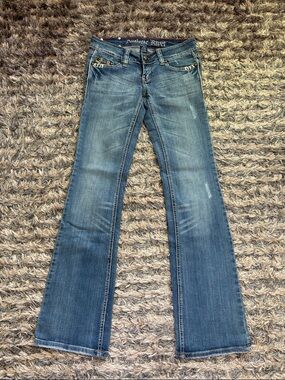 Antique Rivet Low-Rise Cotton Blue Flare Jeans with Subtle Distress